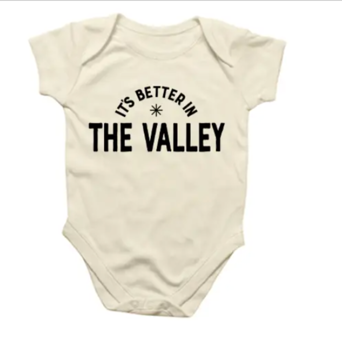 Beige baby onesie with 'It's Better in The Valley' text on a white background