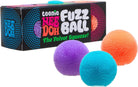 Colorful fuzz balls with packaging labeled 'teenie Nee Doh Fuzz Ball' on a white background.