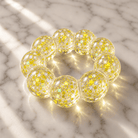 Feelzies™ Original Squishy Bracelet: Electric Lemon - Twirls + Twigs